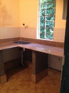 kitchen tiled and granite slabbed working tops